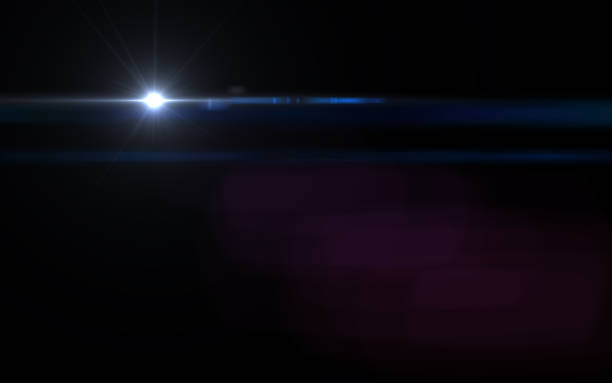 istock Abstract Lens Flare light blue light streak and black background 812473026