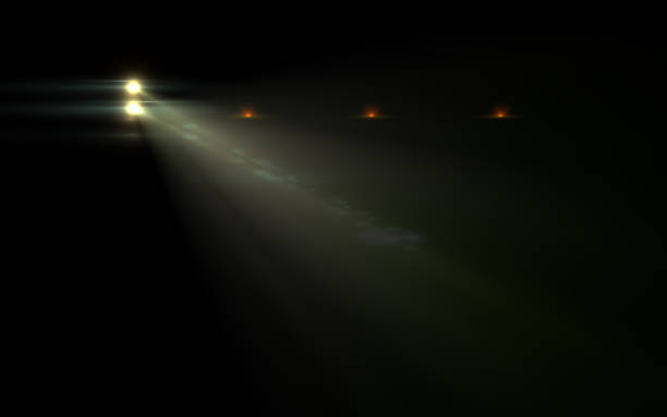 istock Abstract lens flare spot light  over black background 812473120