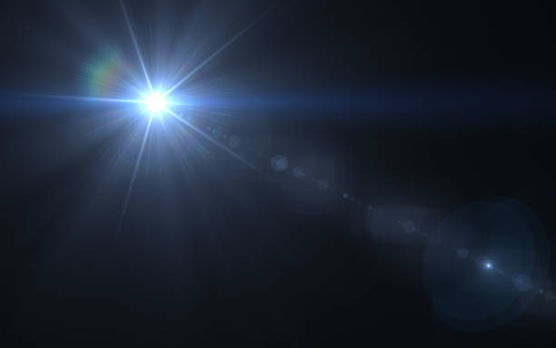 istock Abstract lens flare light over black background 812473626