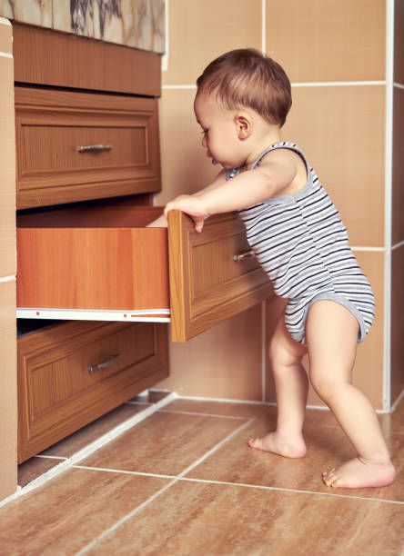 istock Cute baby is learning to walking 812473780