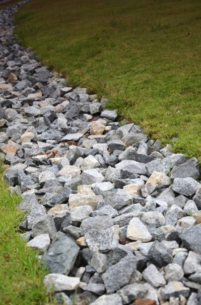 istock Stone and green grass in the garden 812479040