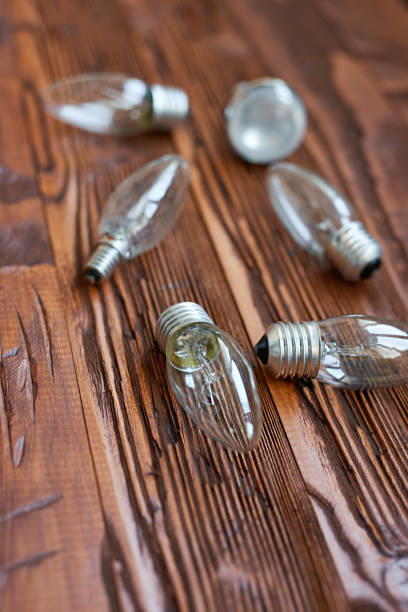 istock concept background of bulb on aged wood board 812481850