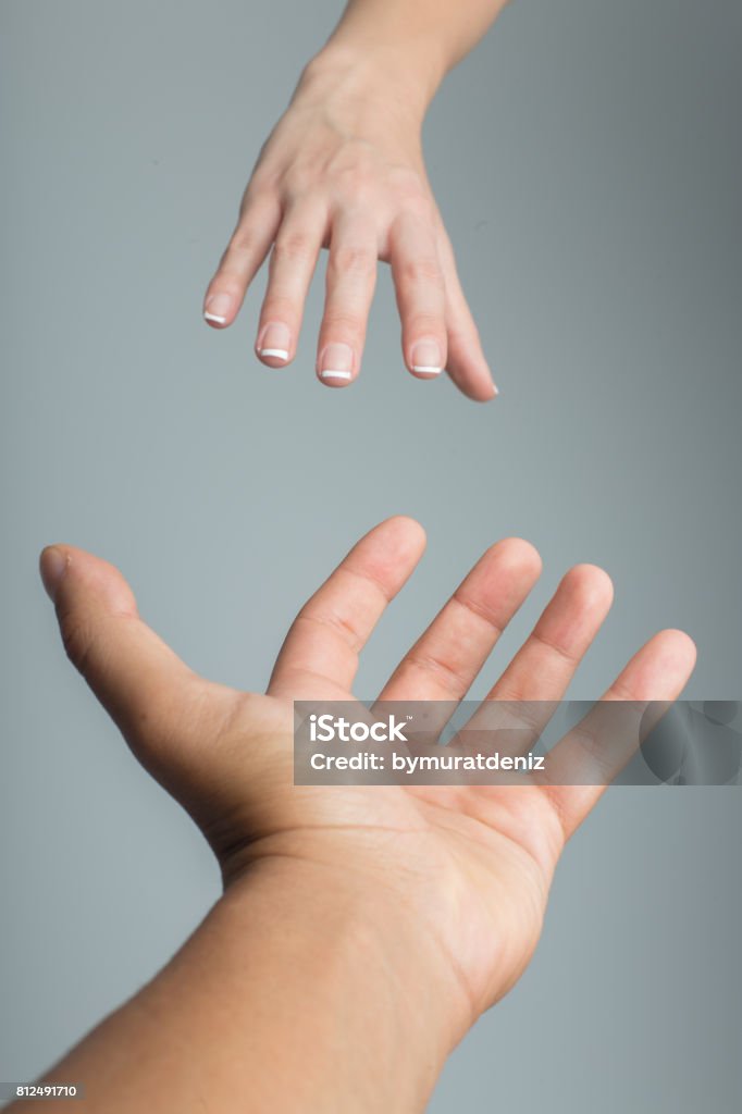 Hand Raching Out For Help Helping Hands Reaching Out For Help Stock Photo - Download Image Now ...