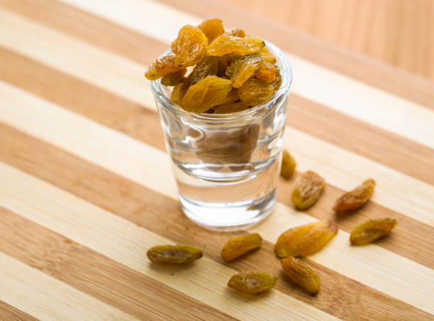 raisins raisins in a small glass singh stock pictures, royalty-free photos & images