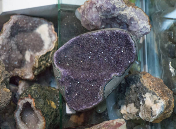istock Raw violet amethyst rock with crystal ametist 812495064