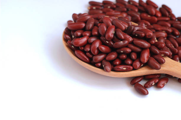 istock Red beans arranged beautiful seeds on a white background 812537066