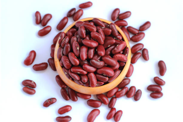 istock Red beans arranged beautiful seeds on a white background 812537894