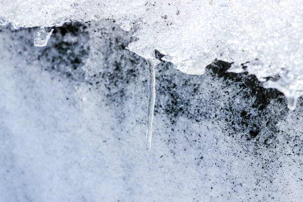 istock close up of melting ice with lava ash 812558370