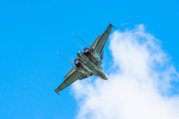 istock Combat aircraft fighter jet fly sky clouds 812563646