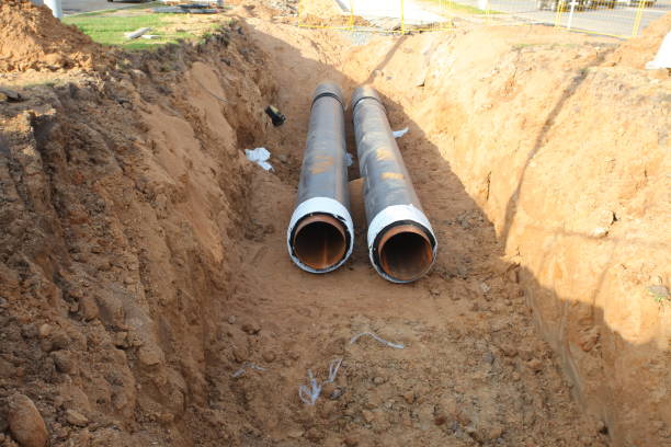 istock sewer pipe in the trench 812571326