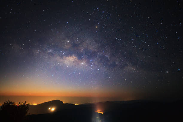 istock Milky Way with lighting on the road at Doi inthanonin 812571380