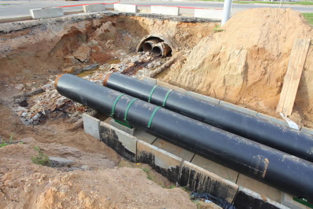 istock sewer pipe in the trench 812575770