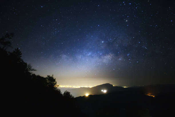 istock Milky Way with lighting on the road at Doi inthanonin 812578988