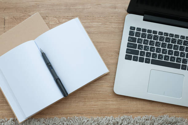 istock Top view of notebook and laptop 812579506