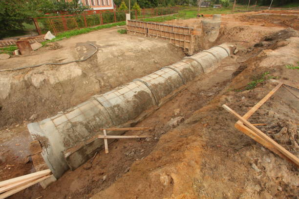 istock sewer pipe in the trench 812579682