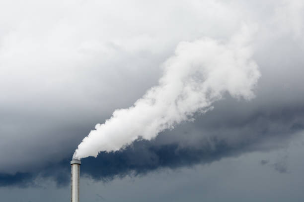 istock Industrial smoke emission from factory chimney. 812588538