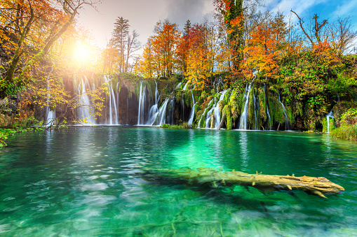 Stunning colorful autumn landscape with spectacular lake and waterfalls in Plitvice lakes National Park, Croatia, Europe