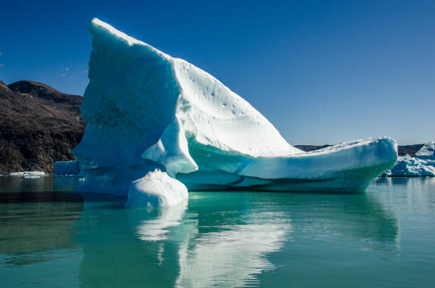 istock Small icebergs and reflections near the coast 812609666