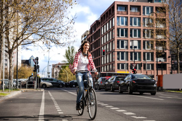 istock Woman cycling - commuter in central Berlin 812622136
