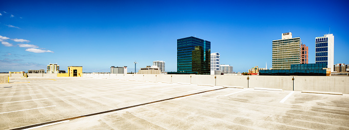 Rooftop parking lot panorama with Fort Lauderdale skyline as background under s clear sky