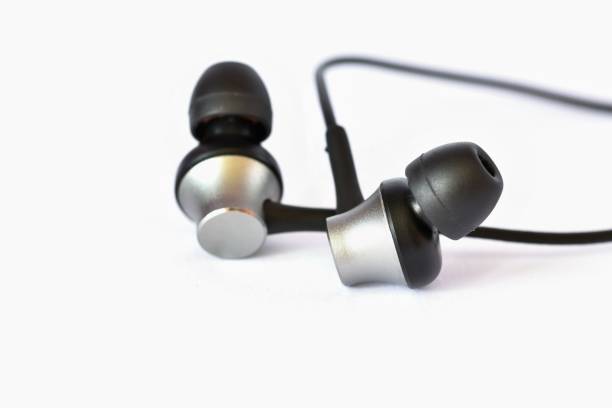 istock Headphones - small black balls. Isolated on a clean white background. 812636288
