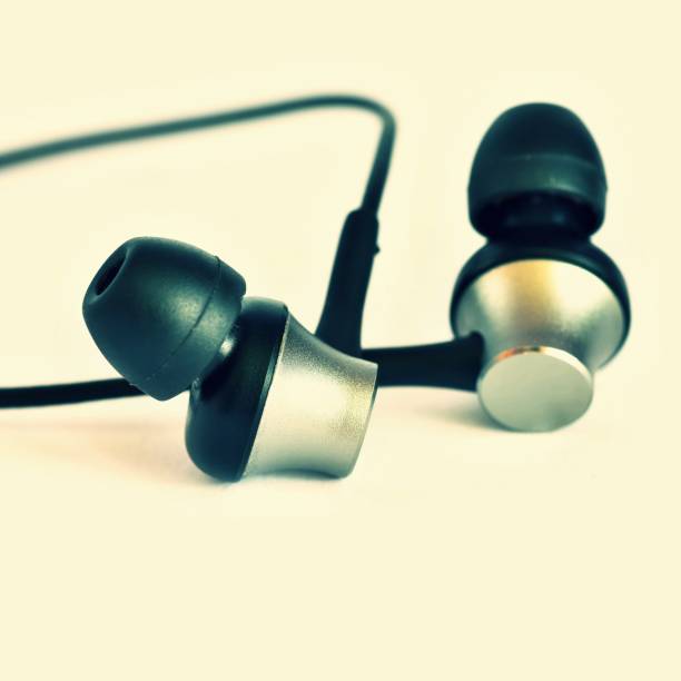 istock Headphones - small black balls. Isolated on a clean white background. 812636546