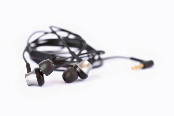 istock Headphones - small black balls. Isolated on a clean white background. 812636752
