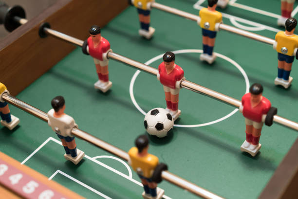 istock Table football game top view close 812660890