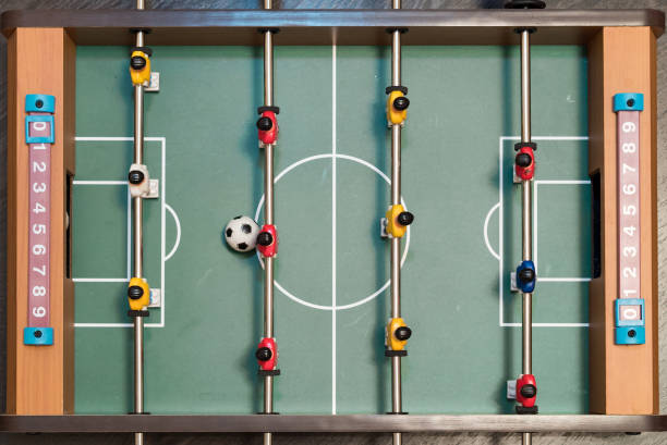 istock Table football game top view close 812660952
