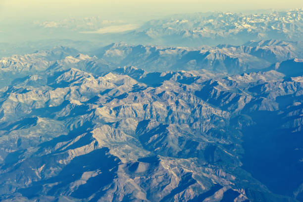 istock Aerial view of Alps mountains from airplane 812686972
