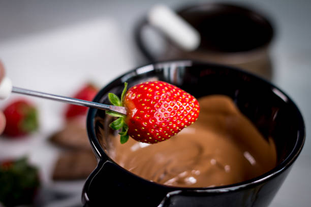 istock Strawberry with chocolate fondue 812699432