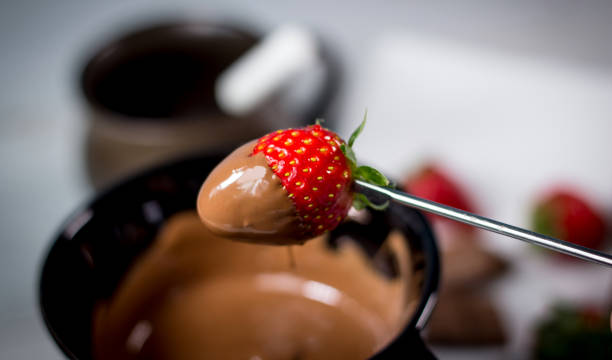 istock Strawberry with chocolate fondue 812699442