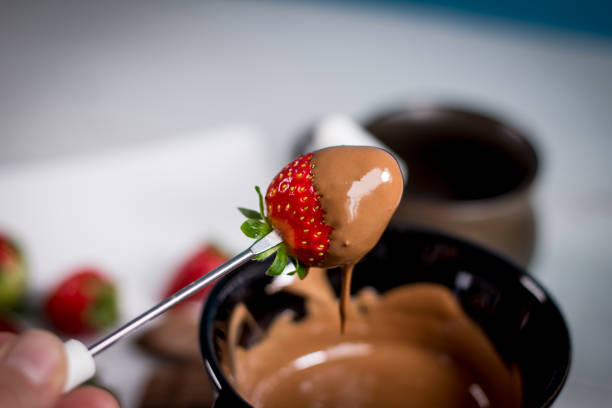 istock Strawberry with chocolate fondue 812701148