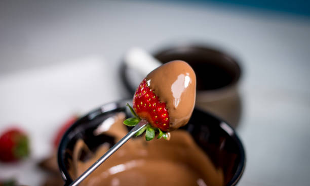 istock Strawberry with chocolate fondue 812701390