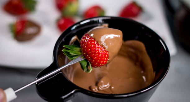 istock Strawberry with chocolate fondue 812701504