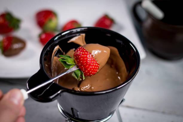 istock Strawberry with chocolate fondue 812702400