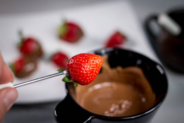 istock Strawberry with chocolate fondue 812703574