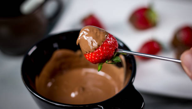 istock Strawberry with chocolate fondue 812703712