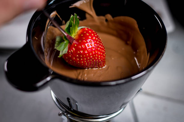 istock Strawberry with chocolate fondue 812703858
