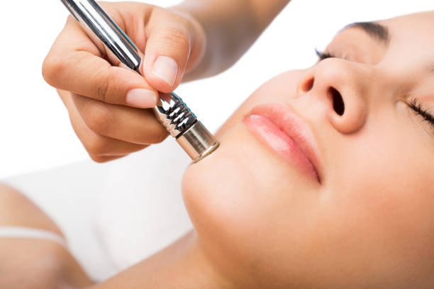 Close up of woman's face on beauty treatment stock photo