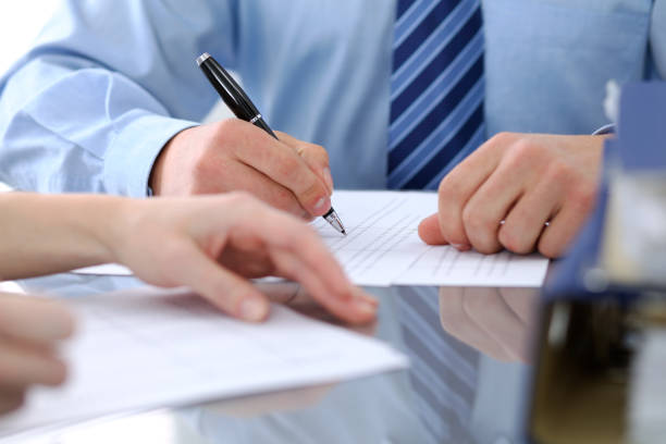 istock Bookkeepers or financial inspector making report, calculating or checking balance. Audit concept. 812753864