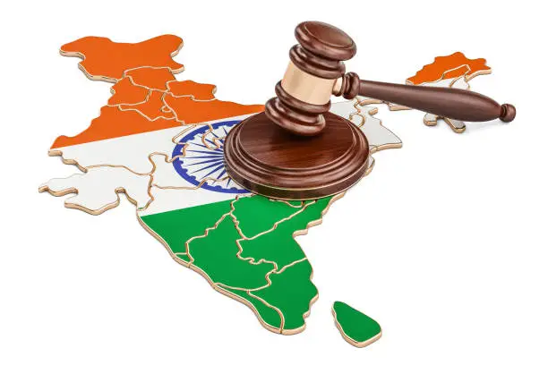 Photo of Wooden Gavel on map of India, 3D rendering isolated on white background