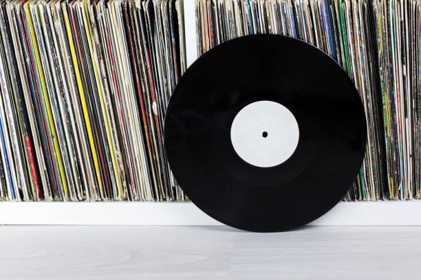 istock One record near stack of old collection of vinyl discs 812776496