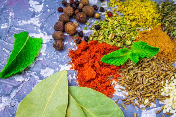 istock Spices and herbs on a black background 812776806