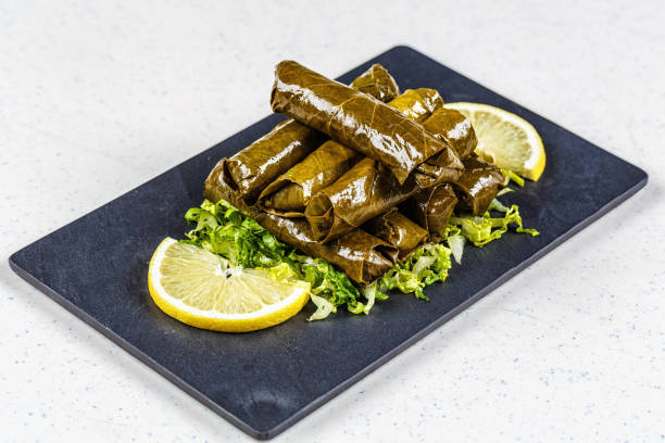 istock Dolma, stuffed grape leaves with rice and meat 812779364