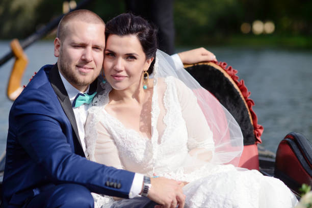 istock Wedding couple is hugging on a floating gondola 812798358