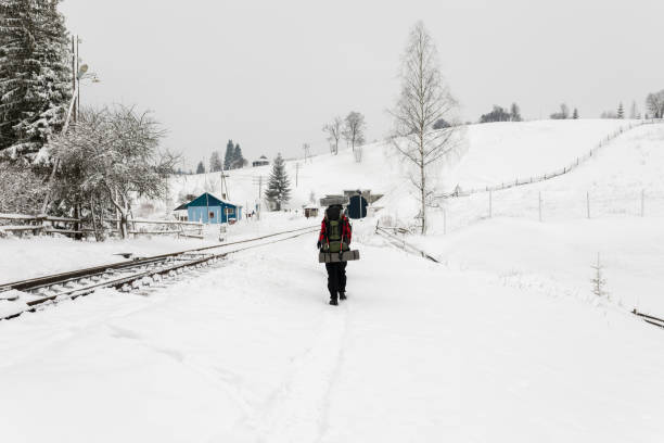 istock Tourist with backpack in Carpathian in winter 812812038
