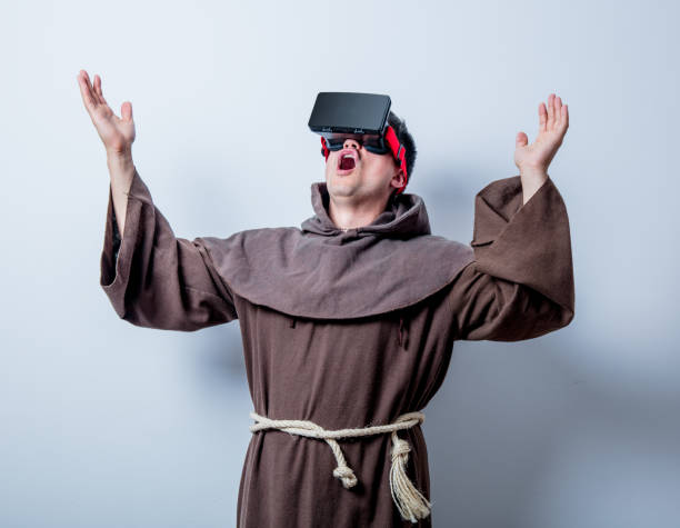 istock Portrait of Young catholic monk with 3D glasses 812815470