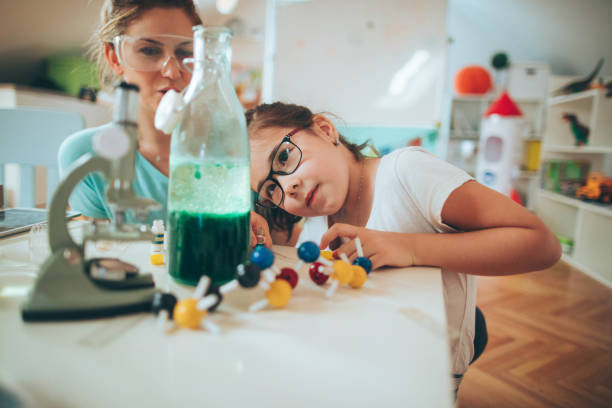 istock Doing chemical experiment with my teacher 812815984