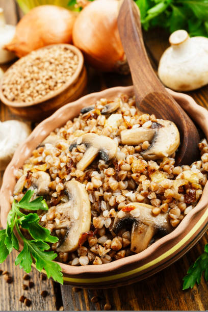istock Buckwheat porridge with champignons 812816104